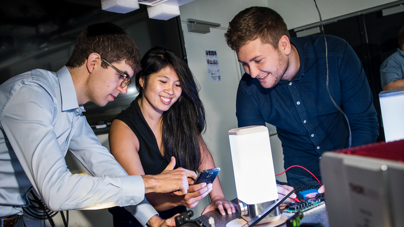 Mai Nguyen and team with Optoceutics device