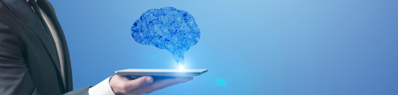 A person in a business suit holds a smartphone. An illustration of a brain composed of blue connecting lines rises from it.